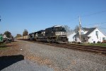 NS 7331 leads a coal train down the River Line